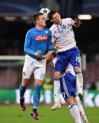(161124) -- NAPLES, Nov. 24, 2016 -- Piotr Zielinski (L) of Napoli vies with Denys Garmash of Dinamo Kiev during the UEFA Champions League Group B match between Napoli and Dynamo Kiev at the San Paolo stadium in Naples on Nov. 23, 2016. The match ended with a 0-0 draw. )(wll) (SP)ITALY-NAPLES-SOCCER-UEFA CHAMPIONS LEAGUE-NAPOLI VS DINAMO KIEV AlbertoxLingria 