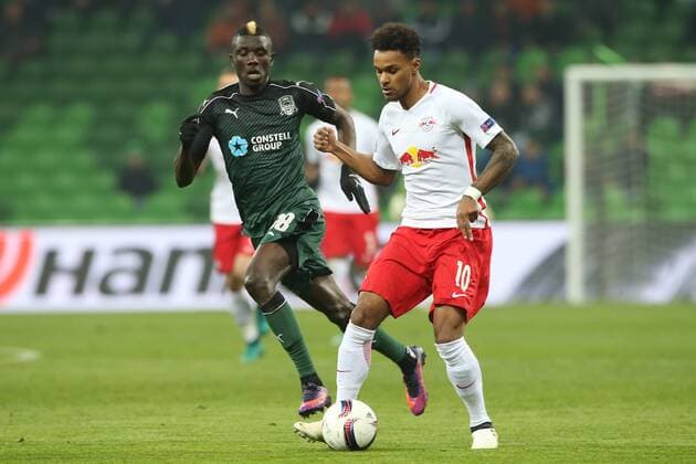SOCCER - EL, Krasnodar vs RBS KRASNODAR,RUSSIA,24.NOV.16 - SOCCER - UEFA Europa League, group stage, FK Krasnodar vs Red Bull Salzburg. Image shows Kouassi Eboue (Krasnodar) and Valentino Lazaro (RBS). GEPAxpictures xMathiasxMandl