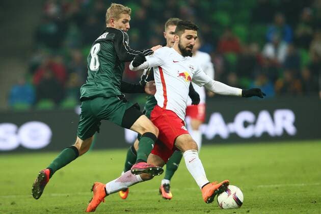 SOCCER - EL, Krasnodar vs RBS KRASNODAR,RUSSIA,24.NOV.16 - SOCCER - UEFA Europa League, group stage, FK Krasnodar vs Red Bull Salzburg. Image shows Yuri Gazinski (Krasnodar) and Munas Dabbur (RBS). GEPAxpictures xFelixxRoittner