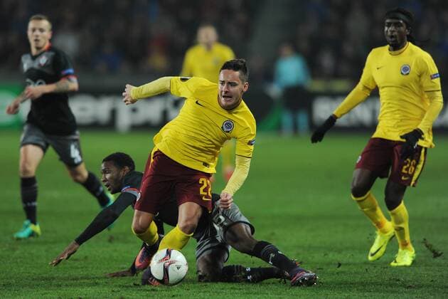 Jordy Clasie, from left, and Cuco Martina of Southampton and Daniel Holzer, front, and Costa Nhamoinesu of Sparta in action during the European league, 5th round, AC Sparta Praha - Southampton FC match in Prague, Czech Republic, on Thursday, November 24, 2016. (CTKxPhoto OndrejxDeml) CTKPhotoP201611240953201  deml 9