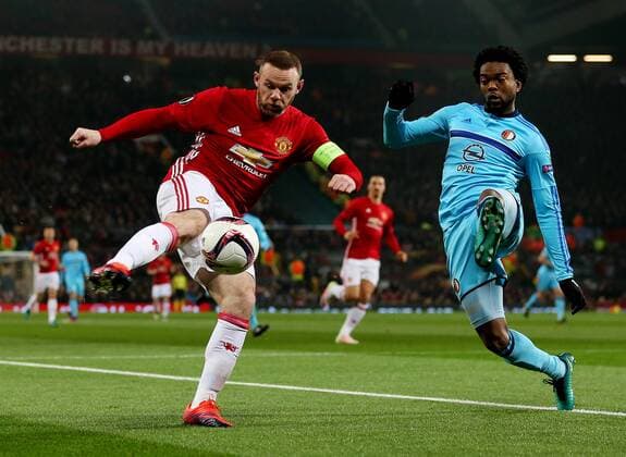 Wayne Rooney of Manchester United ManU takes on Miguel Nelom of Feyenoord during the UEFA Europa League match at Old Trafford, Manchester. Picture date: November 24th 2016. Pic Matt McNulty Sportimage EDITORIAL USE ONLY. No use with unauthorised audio, video, data, fixture lists, club league logos or live services. Online in-match use limited to 120 images, no video emulation. No use in betting, games or single club league player publications.