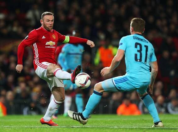 Wayne Rooney of Manchester United ManU and Wessel Dammers of Feyenoord during the UEFA Europa League match at Old Trafford, Manchester. Picture date: November 24th 2016. Pic Matt McNulty Sportimage EDITORIAL USE ONLY. No use with unauthorised audio, video, data, fixture lists, club league logos or live services. Online in-match use limited to 120 images, no video emulation. No use in betting, games or single club league player publications.