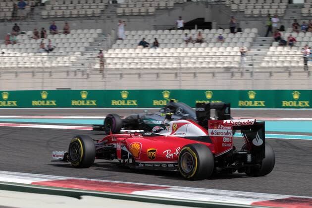 Abu Dhabi Grand Prix, UAE 24 - 27 November 2016 25.11.2016 - Free Practice 1, Kimi Raikkonen (FIN) Scuderia Ferrari SF16-H and Nico Rosberg (GER) Mercedes AMG F1 W07 Hybrid 