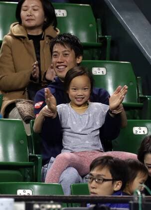 November 26, 2016, Tokyo, Japan - Japan s Kei Nishikori and family members of former French Opens Tennis champion Michael Chang enjoy to the game of Michael Chang against Japan s Taro Daniel during an annual charity tennis match Dream Tennis Ariake in Tokyo on Saturday, November 26, 2016. Admission money will be donated for the rebuild of tennis facilities at the tsunami affected area in northern Japan. NOxTHIRDxPARTYxSALES.  (lwxa006492)