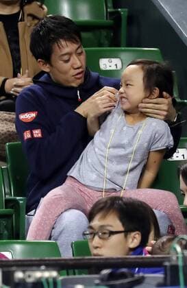 November 26, 2016, Tokyo, Japan - Japan s Kei Nishikori and family members of former French Opens Tennis champion Michael Chang enjoy to the game of Michael Chang against Japan s Taro Daniel during an annual charity tennis match Dream Tennis Ariake in Tokyo on Saturday, November 26, 2016. Admission money will be donated for the rebuild of tennis facilities at the tsunami affected area in northern Japan. NOxTHIRDxPARTYxSALES.  (lwxa006494)