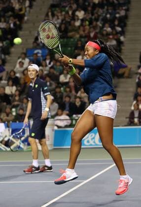 November 26, 2016, Tokyo, Japan - Japan s Taro Daniel and Naomi Osaka pair return the ball against Japan s Kei Nishikori and Nao Hibino pair during an annual charity tennis match Dream Tennis Ariake in Tokyo on Saturday, November 26, 2016. Admission money will be donated for the rebuild of tennis facilities at the tsunami affected area in northern Japan. NOxTHIRDxPARTYxSALES.  (lwxa006504)