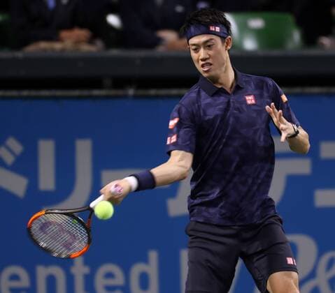 November 26, 2016, Tokyo, Japan - Japan s Kei Nishikori returns the ball against former world number one ranker Andy Roddick of the United States during an annual charity tennis match Dream Tennis Ariake in Tokyo on Saturday, November 26, 2016. Admission money will be donated for the rebuild of tennis facilities at the tsunami affected area in northern Japan. NOxTHIRDxPARTYxSALES.  (lwxa006507)