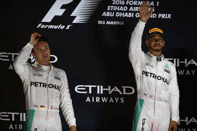 Abu Dhabi Grand Prix, UAE 24 - 27 November 2016 27.11.2016 - Race, 2nd place Nico Rosberg (GER) Mercedes AMG F1 W07 Hybrid and Champion 2016 and Lewis Hamilton (GBR) Mercedes AMG F1 W07 Hybrid race winner 