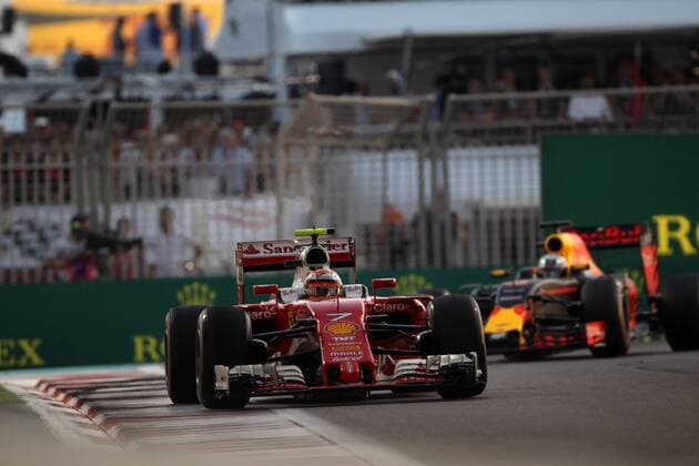 Abu Dhabi Grand Prix, UAE 24 - 27 November 2016 27.11.2016 - Race,Kimi Raikkonen (FIN) Scuderia Ferrari SF16-H leads Daniel Ricciardo (AUS) Red Bull Racing RB12 
