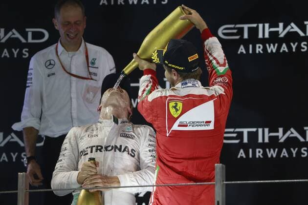 Formel 1, GP von Abu Dhabi, Nico Rosberg ist Weltmeister Abu Dhabi Grand Prix, UAE 24 - 27 November 2016 27.11.2016 - Race, 2nd place Nico Rosberg (GER) Mercedes AMG F1 W07 Hybrid and Champion 2016 and 3rd place Sebastian Vettel (GER) Scuderia Ferrari SF16-H 