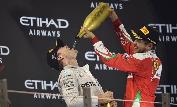 World Champion Nico Rosberg; Mercedes Grand Prix, Sebastian Vettel, Scuderia Ferrari, formula 1 GP, Abu Dhabi, Yas Marina Circuit, VAE, 27.11.2016 Photo:mspb Jerry Andre World Champion Nico Rosberg; Sebastian Vettel, formula 1 GP, Abu Dhabi,