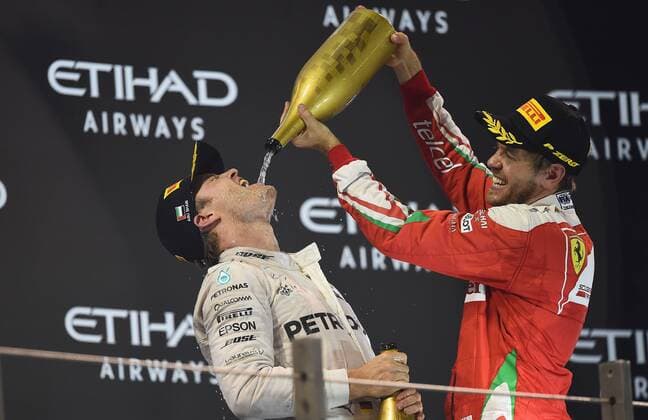 World Champion Nico Rosberg; Mercedes Grand Prix, Sebastian Vettel, Scuderia Ferrari, formula 1 GP, Abu Dhabi, Yas Marina Circuit, VAE, 27.11.2016 Photo:mspb Jerry Andre World Champion Nico Rosberg; Sebastian Vettel, formula 1 GP, Abu Dhabi,