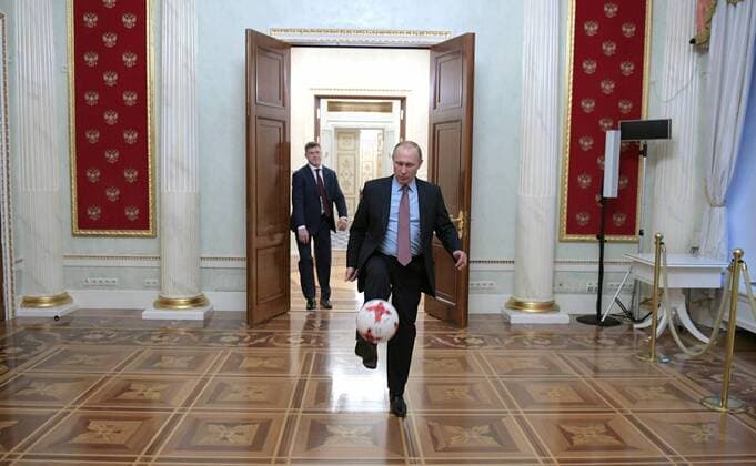 November 25, 2016. - Russia, Moscow. - Russian President Vladimir Putin with a ball after meeting with FIFA President Gianni Infantino in the Kremlin. KremlinxxPool 