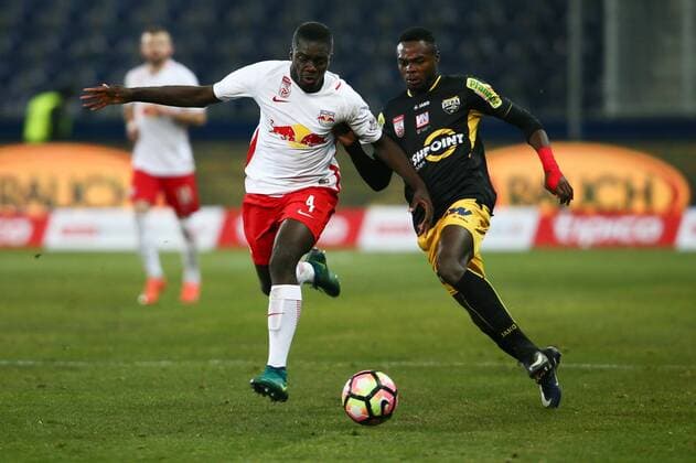 SOCCER - BL, RBS vs Altach SALZBURG,AUSTRIA,03.DEC.16 - SOCCER - tipico Bundesliga, Red Bull Salzburg vs SCR Altach. Image shows Dayot Upamecano (RBS) and Dimitri Joseph Oberlin (Altach). GEPAxpictures xFelixxRoittner