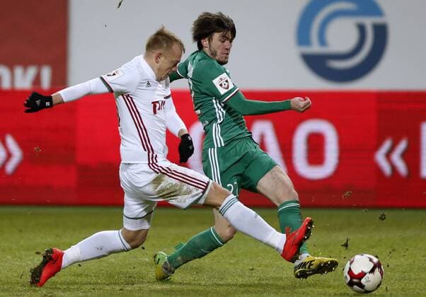 MOSCOW, RUSSIA - DECEMBER 4, 2016: Lokomotiv Moscow s Renat Yanbayev (L) and Terek Grozny s Reziuan Mirzov fight for the ball in their 2016 17 Russian Premier League Round 17 football match at Lokomotiv Stadium. Mikhail Japaridze TASS  TS039E22