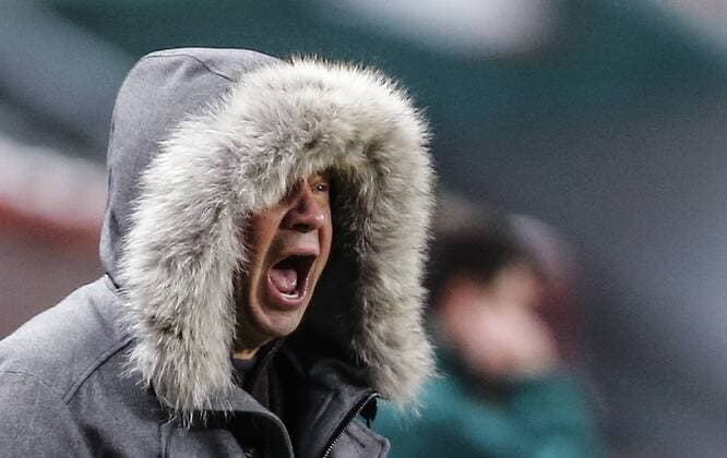 MOSCOW, RUSSIA - DECEMBER 4, 2016: Lokomotiv Moscow s head coach Yuri Syomin reacts in the 2016 17 Russian Premier League Round 17 football match against FC Terek Grozny at Lokomotiv Stadium. FC Lokomotiv Moscow won the game 2-0. Mikhail Japaridze TASS  TS039E34