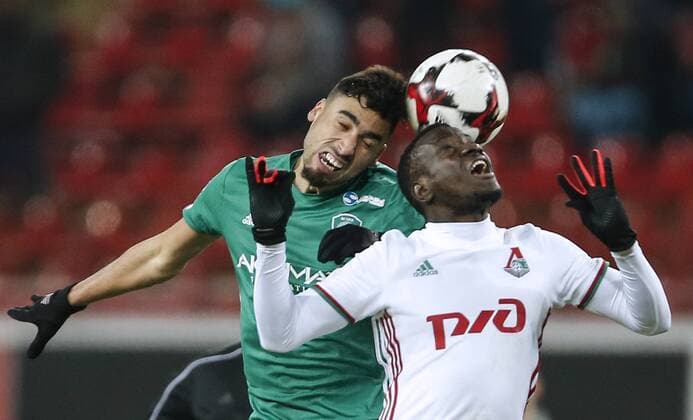 MOSCOW, RUSSIA - DECEMBER 4, 2016: Terek Grozny s Facundo Piriz (L) and Lokomotiv Moscow s Delvin N Dinga fight for the ball in their 2016 17 Russian Premier League Round 17 football match at Lokomotiv Stadium. FC Lokomotiv Moscow won the game 2-0. Mikhail Japaridze TASS  TS039E38