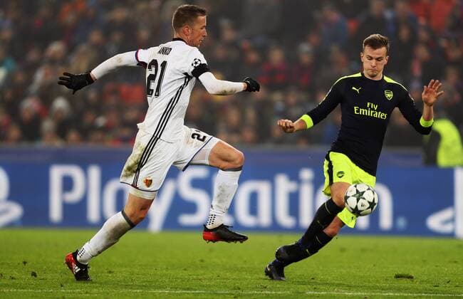 SOCCER - CL, Basel vs Arsenal BASEL,SWITZERLAND,06.DEC.16 - SOCCER - UEFA Champions League, group stage, FC Basel vs Arsenal FC. Image shows Marc Janko (Basel) and Rob Holding (Arsenal). GEPAxpictures xMatthiasxHauer