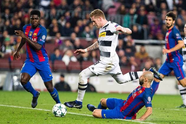 FC Barcelona Barca s Samuel Umiti, Javier Mascherano, VfL Borussia Monchengladbach s Andre Hahn during Champions League match between Futbol Club Barcelona and VfL Borussia Mönchengladbach at Camp Nou Stadium in Barcelona , Spain. December 06, 2016.  (20161206105)
