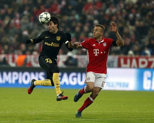 Champions League match between FC Bayern Munich and Atletico Madrid. In this picture, Gaitan and Rafinha. xPabloxGarciax 