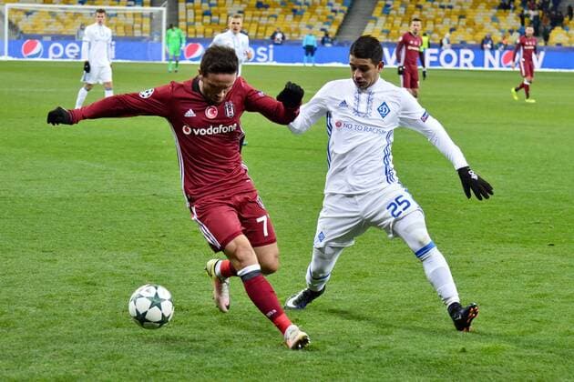 Ukraine: FC Dynamo Kyiv v Besiktas Dynamo Kyiv s Derlis Gonzalez in action against Besiktas Gokhan Gonul during the UEFA Champions League football match between FC Dynamo Kyiv and Besiktas at the Olympiyski Stadium in Kiev. Dynamo Kyiv wins 6-0 against Besiktas.  AleksandrxGusevx xPacificxPress