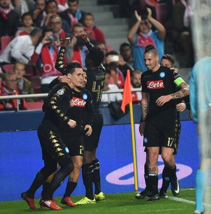 LISBON, Dec. 6, 2016 -- Napoli s Jose Callejon (1st L) celebrates his goal with his teammates during the UEFA Champions League Group B soccer match against Benfica at Luz stadium in Lisbon, Portugal, Dec. 6, 2016. Napoli won 2-1. ) (SP)PORTUGAL-LISBON-SOCCER-UEFA CHAMPIONS LEAGUE ZhangxLiyun 