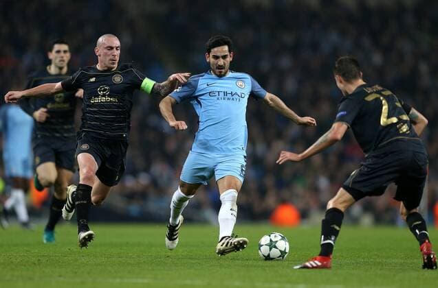 Ilkay Gundogan of Manchester City tussles with Scott Brown of Celtic during the Champions League Group C match at the Etihad Stadium, Manchester. Picture date: December 6th, 2016. Pic Simon Bellis Sportimage EDITORIAL USE ONLY. No use with unauthorised audio, video, data, fixture lists, club league logos or live services. Online in-match use limited to 120 images, no video emulation. No use in betting, games or single club league player publications.