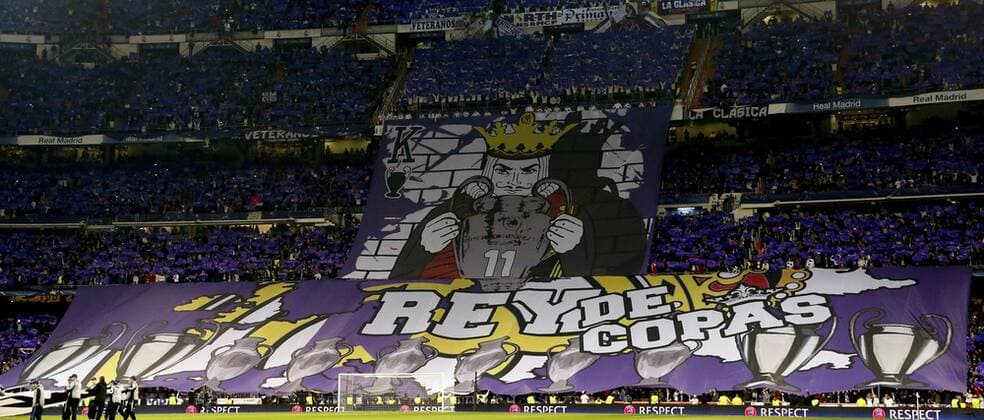 Real Madrid s fans cheer on their team with a banner that reads King of Cups during the UEFA Champions League 6th round match between Real Madrid and Borussia Dortmund at Santiago Bernabeu stadium in Madrid, Spain, 07 December 2016. REAL MADRID VS. BORUSIA DORTMUND !ACHTUNG: NUR REDAKTIONELLE NUTZUNG!  MAD001 20161207-636167418451757365