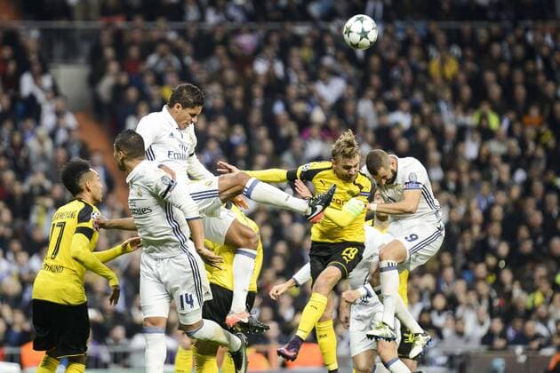 Real Madrid s Carlos Henrique Casemiro, Rafael Varanne, Karim Benzema and Borussia Dortmund Pierre-Emerick Aubameyang, Marcel Schmelzer during the UEFA Champions League match between Real Madrid and Borussia Dortmund at Santiago Bernabeu Stadium in Madrid, Spain. December 07, 2016.  (20161207002)