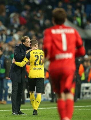 07.12.2016, Fussball Champions-League 2016 2017, Vorrunde 6.Spieltag, Real Madrid - Borussia Dortmund im Estadio Santiago Bernabeu Madrid (Spanien). Schlussjubel v.l. Trainer Thomas Tuchel (Dortmund) und Lukasz Piszczek (Dortmund) 