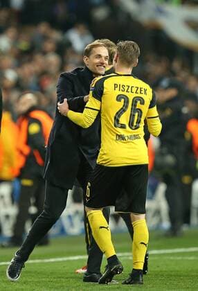 07.12.2016, Fussball Champions-League 2016 2017, Vorrunde 6.Spieltag, Real Madrid - Borussia Dortmund im Estadio Santiago Bernabeu Madrid (Spanien). Schlussjubel v.l. Trainer Thomas Tuchel (Dortmund) und Lukasz Piszczek (Dortmund) 