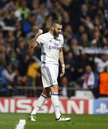 Champions League match played between Real Madrid and Borussia Dortmund. In this picture, Benzema scores celebrates first goal. xAngelxRiverox 