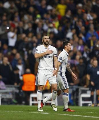 Champions League match played between Real Madrid and Borussia Dortmund. In this picture, Benzema scores celebrates first goal. xAngelxRiverox 