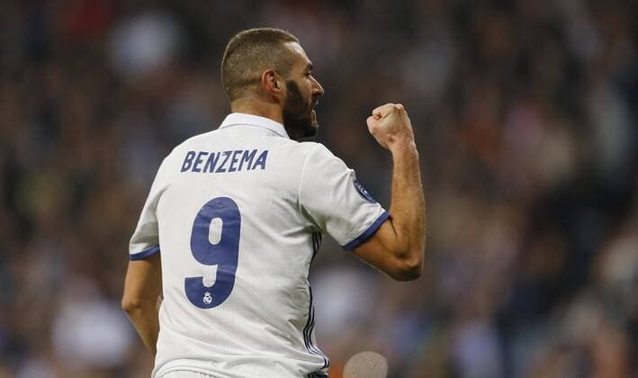 Champions League match played between Real Madrid and Borussia Dortmund. In this picture, Benzema scores celebrates first goal. xAngelxRiverox 