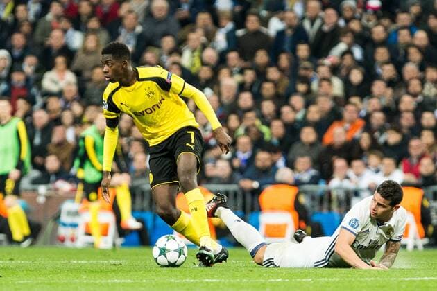 Borussia Dortmund Ousmane Cembele, Real Madrid s James Rodriguez during Champions League match between Real Madrid and Borussia Dortmund at Santiago Bernabeu Stadium in Madrid , Spain. December 07, 2016.  (20161207042)
