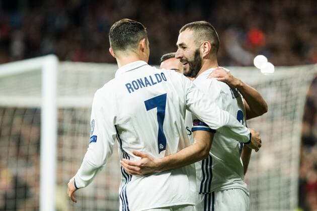 Real Madrid s Cristiano Ronaldo, Karim Benzema during Champions League match between Real Madrid and Borussia Dortmund at Santiago Bernabeu Stadium in Madrid , Spain. December 07, 2016.  (20161207049)