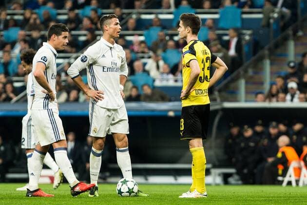 Real Madrid s Cristiano Ronaldo, Borussia Dortmund Julian during Champions League match between Real Madrid and Borussia Dortmund at Santiago Bernabeu Stadium in Madrid , Spain. December 07, 2016.  (20161207066)