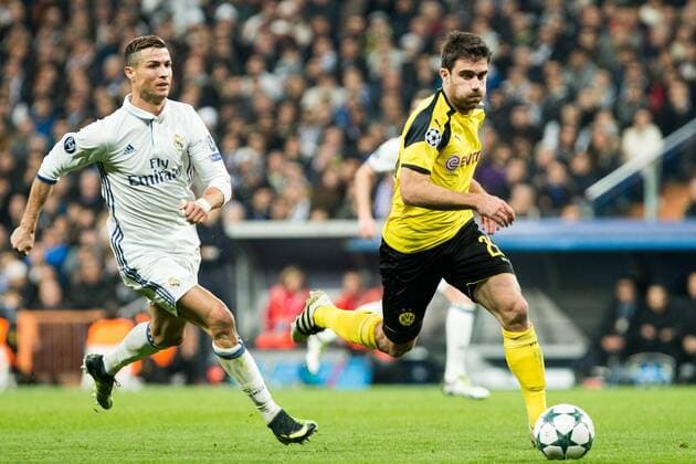 Real Madrid s Cristiano Ronaldo, Borussia Dortmund Erik Durm during Champions League match between Real Madrid and Borussia Dortmund at Santiago Bernabeu Stadium in Madrid , Spain. December 07, 2016.  (20161207082)