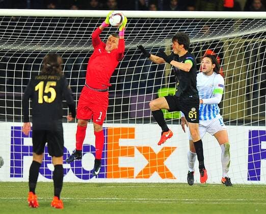 Zurich s goalkeeper Andris Vanins and Osmanlispor s Numan Curuksu during a UEFA European League, group L soccer match, between Osmanlispor and Zurich at Osmanli Stadyumu in Ankara, 12th of December, 2016. (  Copyright: HikmetxSaatci 15577831