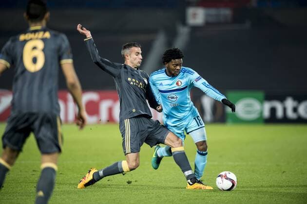 (L-R) Robin van Persie of Fenerbahce, SK Miquel Nelom of Feyenoordduring the Europa League group A match between Feyenoord and Fenerbahce SK on December 08, 2016 at the Kuip stadium in Rotterdam, The Netherlands. Feyenoord v Fenerbahce SK UEFA Europa League 2016 2017 xVIxGerritxvanxKeulenxIVx 6726339