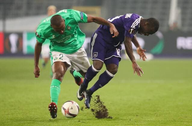 Saint-Etienne s Kevin Theophile-Catherine and Anderlecht s Frank Acheampong fight for the ball during the sixth and last game in the group stage (group C) of the UEFA Europa League competition between Belgian soccer club RSC Anderlecht and French club AS Saint-Etienne, in Brussels, Thursday 08 December 2016. Anderlecht is already qualified for the next stage. VIRGINIExLEFOUR  x04993950x