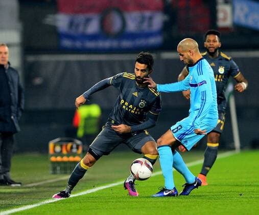 UEFA Europa League Group A day 6 match between Feyenoord and Fenerbahce at De Kuip Stadium in Rotterdam , Netherlands , December 08 , 2016. Pictured: Alper Potuk 7 of Fenerbahce and Karim El Ahmadi 8 of Feyenoord. 
