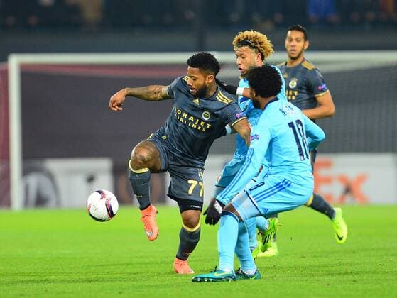 UEFA Europa League Group A day 6 match between Feyenoord and Fenerbahce at De Kuip Stadium in Rotterdam , Netherlands , December 08 , 2016. Pictured: Jeremain Lens of Fenerbahce and Miquel Nelom 18 of Feyenoord. 