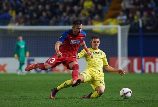 December 8, 2016 - Vila-Real, Castellon, Spain - Gabriel Santos Borre of Villarreal CF and Alin Tosca of FC Steaua Bucuresti during the UEFA Europa League group L football match beetween Villarreal CF and Steaua Bucuresti at Estadio El Madrigal, in Vila-real, Spain on December 8, 2016. Villarreal CF v FC Steaua Bucuresti - UEFA Europa League  - ZUMAn230 20161208_zaa_n230_007