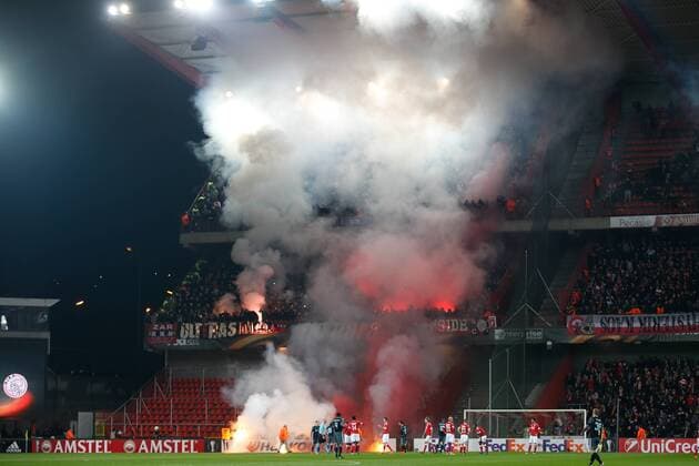 Illustration picture shows fireworks on the pitch during the sixth and last game of the group stage (group G) of the Europa League competition between Belgian soccer team Standard de Liege and Dutch club Ajax Amsterdam in Liege, Thursday 08 December 2016. BRUNOxFAHY  x04994150x