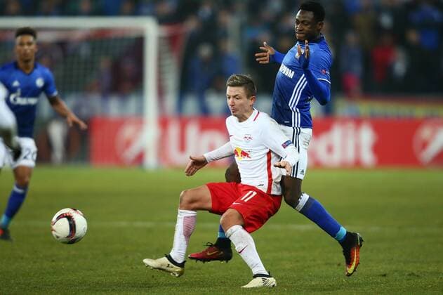 SOCCER - UEFA EL, RBS vs Schalke SALZBURG,AUSTRIA,08.DEC.16 - SOCCER - UEFA Europa League, group stage, Red Bull Salzburg vs FC Schalke 04. Image shows Marc Rzatkowski (RBS) and Abdul Baba Rahman (Schalke). GEPAxpictures xFelixxRoittner