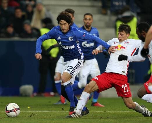 SOCCER - UEFA EL, RBS vs Schalke SALZBURG,AUSTRIA,08.DEC.16 - SOCCER - UEFA Europa League, group stage, Red Bull Salzburg vs FC Schalke 04. Image shows Atsuto Uchida (Schalke) and Stefan Lainer (RBS). GEPAxpictures xThomasxBachun