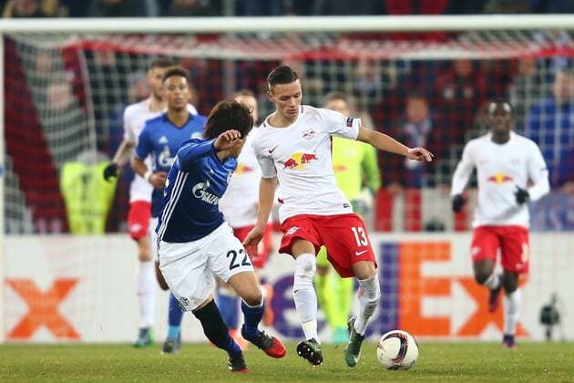 SOCCER - UEFA EL, RBS vs Schalke SALZBURG,AUSTRIA,08.DEC.16 - SOCCER - UEFA Europa League, group stage, Red Bull Salzburg vs FC Schalke 04. Image shows Hannes Wolf (RBS) and Atsuto Uchida (Schalke). GEPAxpictures xFelixxRoittner