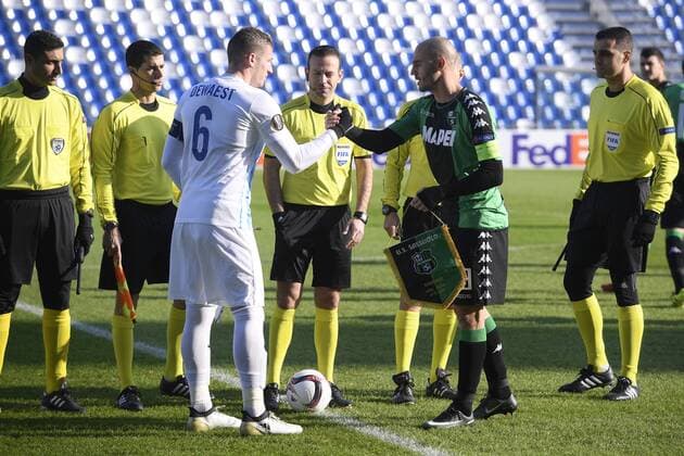 Genk s Sebastien Dewaest and Sassuolo s Paolo Cannavaro pictured before the start of a soccer game between Italian Club U.S. Sassuolo Calcio and Belgian team KRC Genk in Parma, Italy, Friday 09 December 2016, the sixth and last game of the group stage of the Europa League competition, in Group F. The match was scheduled for yesterday, but it was postponed due to heavy fog. YORICKxJANSENS  x04994424x