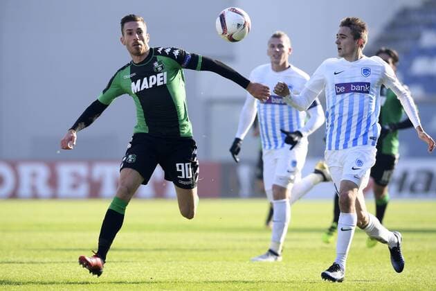Sassuolo s Antonino Ragusa and Genk s Timothy Castagne fight for the ball during a soccer game between Italian Club U.S. Sassuolo Calcio and Belgian team KRC Genk in Parma, Italy, Friday 09 December 2016, the sixth and last game of the group stage of the Europa League competition, in Group F. The match was scheduled for yesterday, but it was postponed due to heavy fog. YORICKxJANSENS  x04994461x